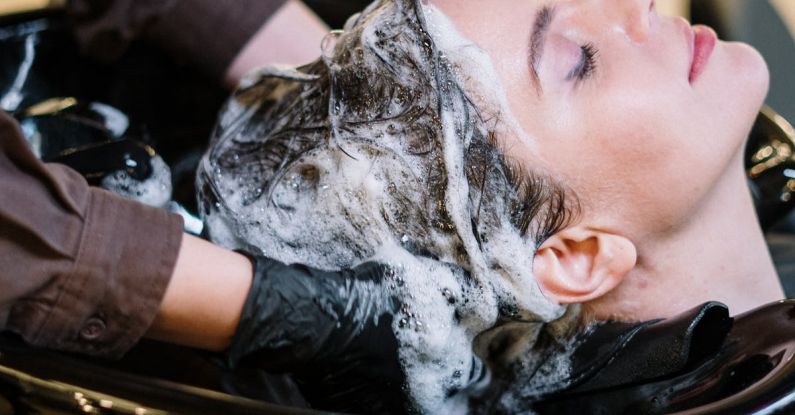 Shampoo - Person Washing Woman's Hair