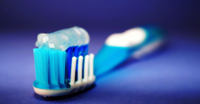 Brushing - Closeup and Selective Focus Photography of Toothbrush With Toothpaste