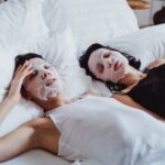 Facial Masks - Two Women Relaxing in Bed