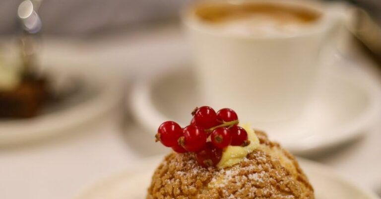 Mindful Eating - Closeup of a Macaroon Cake with Redberries, on a Table