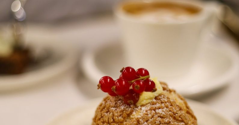 Mindful Eating - Closeup of a Macaroon Cake with Redberries, on a Table